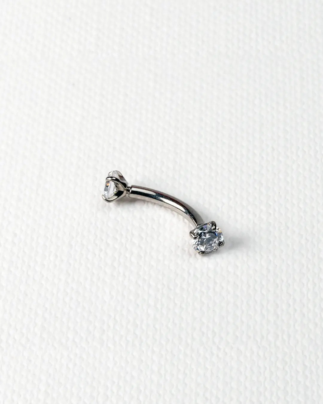 Aira Double CZ Rook Eyebrow Curved Barbell 16G